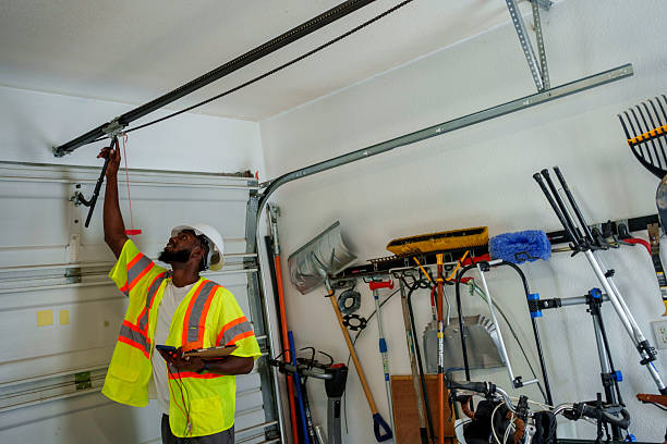 Professional Garage Door Panel Replacement technician working in Falls County County, TX